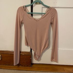 free people light pink shimmery bodysuit